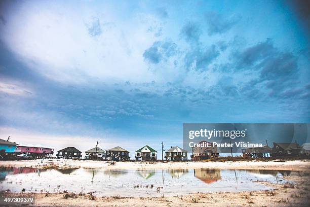 beach houses. - gulf coast stock pictures, royalty-free photos & images