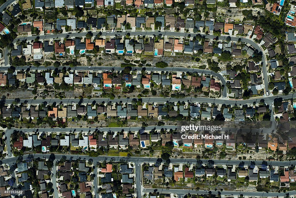 An aerial view of  suburbian housing and garden