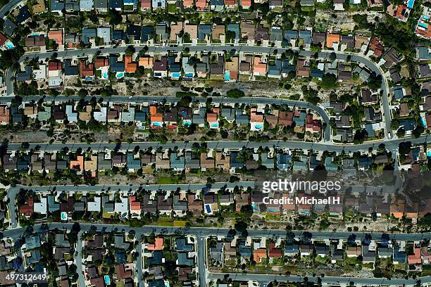 an aerial view of  suburbian housing and garden - california suburb stock pictures, royalty-free photos & images