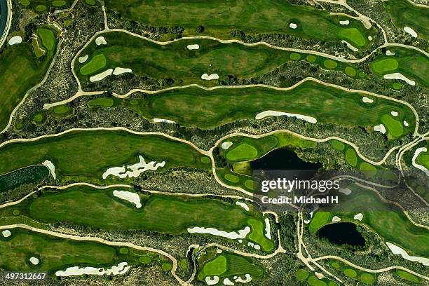 aeriel view on a golf green - green golf course fotografías e imágenes de stock