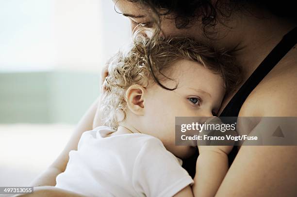 mother and daughter - thumb sucking stock pictures, royalty-free photos & images