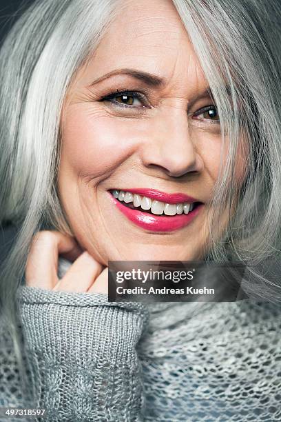 tight portrait of grey haired lady with red lips. - woman lipstick stock pictures, royalty-free photos & images