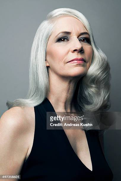 elegant grey haired lady in black dress, portrait. - ballkleider stock-fotos und bilder