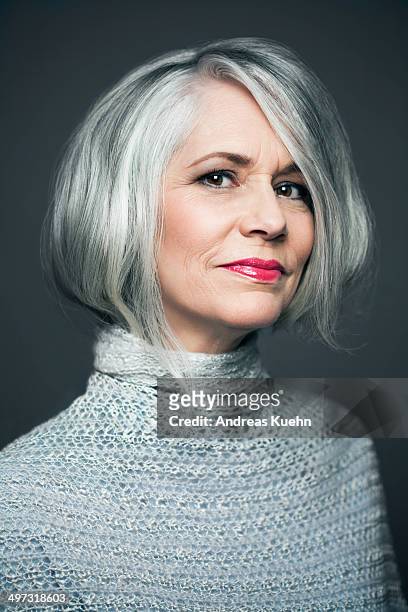 grey haired lady with red lipstick, portrait. - mature woman face beauty stock-fotos und bilder