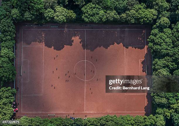 aerial view of red soccer field - football pitch top view stock pictures, royalty-free photos & images