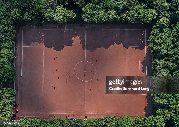 aerial view of red soccer field - aerial view of football field imagens e fotografias de stock