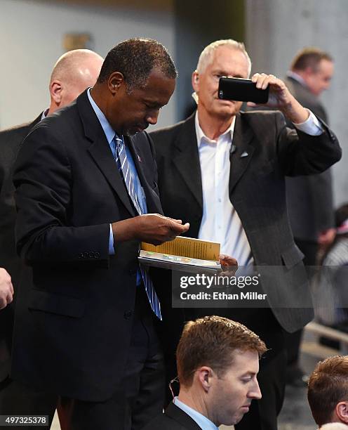 Republican presidential candidate Ben Carson signs autographs after speaking at a campaign rally at the Henderson Pavilion on November 15, 2015 in...