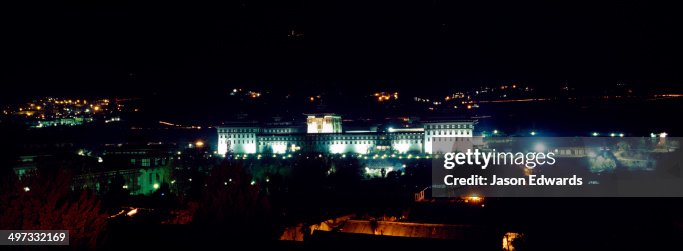 Spotlights illuminate the facade of the Royal Palace of the King of Bhutan. Spotlights illuminate the facade of the Royal Palace of the King of Bhutan.