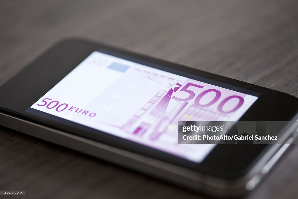 Smartphone displaying image of five-hundred euro banknote