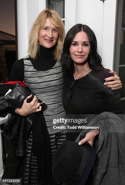 Actors Laura Dern and Courteney Cox attend Rock4EB! 2015 with Ed Sheeran and David Spade on November 15, 2015 in Malibu, California.