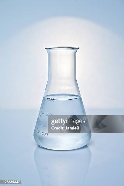 conical flask with liquid - conical flask stock pictures, royalty-free photos & images