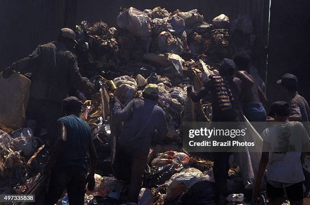 Pickers sort through garbage finding recyclables as a means of survival at Metropolitan Landfill of Jardim Gramacho in Duque de Caxias city, one of...