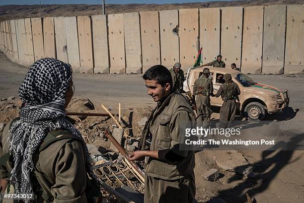 Militants are seen in the center of Sinjar city a day after the city was liberated.