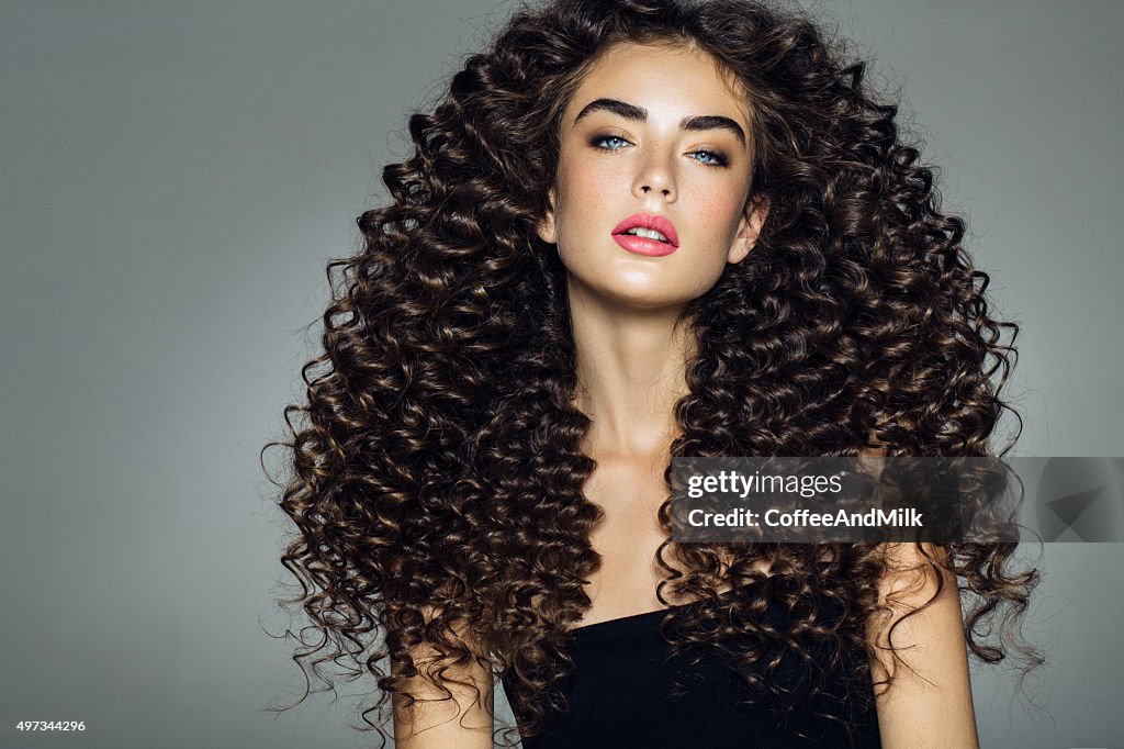 Studio shot of young beautiful woman