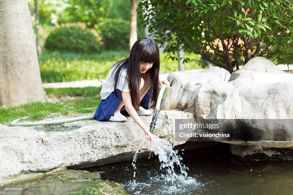Girl holding water pipe