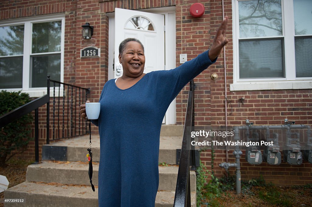 WASHINGTON, DC - NOVEMBER 2: Janet Sharpe waves to a passing ne