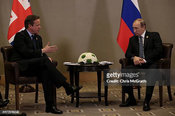 British Prime Minister David Cameron and Russian President Vladimir Putin talk during their bilateral meeting on day two of the G20 Turkey Leaders...