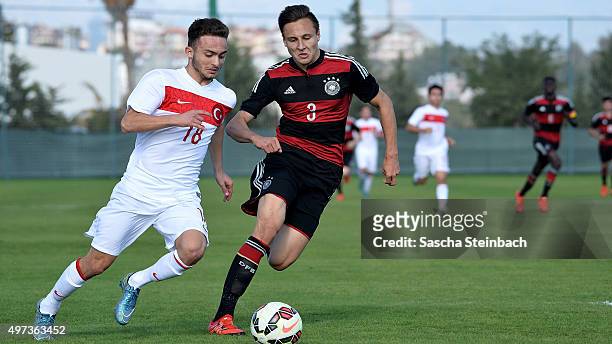 Volkan Egri of Turkey vies with Dominik Franke of Germany during the U18 four nations friendly tournament match between Turkey and Germany at Emirhan...