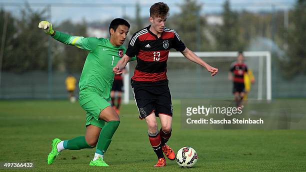 Jannik Mause of Germany goes past goalkeeper Irfan Can Egribayat of Turkey during the U18 four nations friendly tournament match between Turkey and...