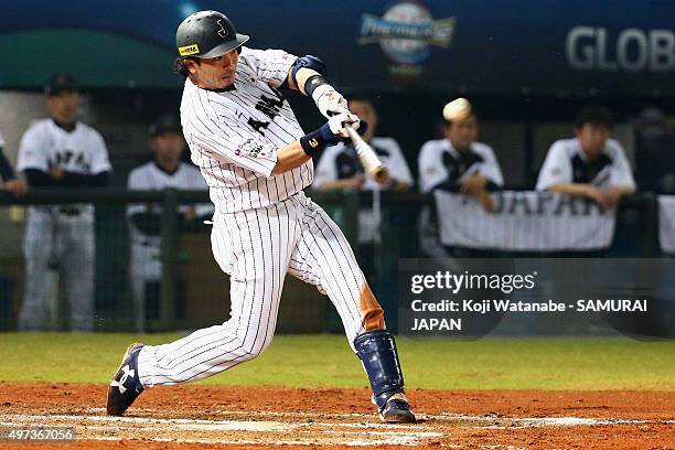 Infielder Nobuhiro Matsuda of Japan hits a sacrifice fly to make 6-0 in the bottom of seventh inning during the WBSC Premier 12 quarter final match...