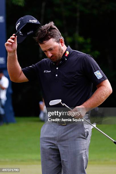 Graeme McDowell of Northern Ireland celebrates on the 18th hole green after winning the three man playoff in the final round of the OHL Classic at...