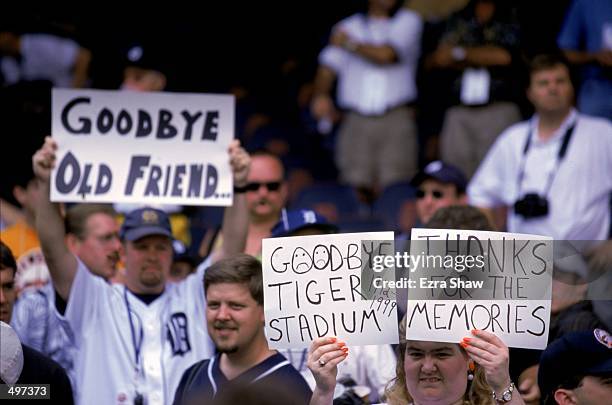 View of the Tiger fans as they hold up signs of "Goodbye" taken during the last game played at the Tiger Stadium against the Kansas City Royals in...