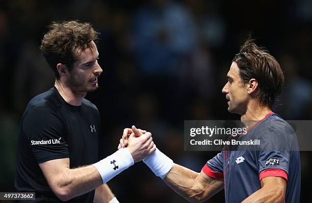 Andy Murray of Great Britain shakes hands with David Ferrer of Spain after their men's singles match during day two of the Barclays ATP World Tour...