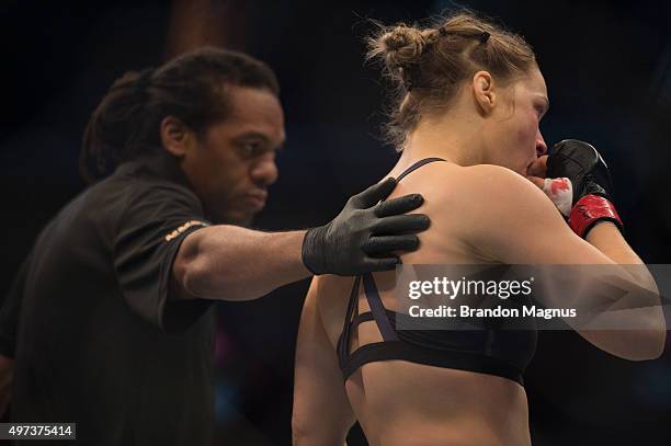 Ronda Rousey prepares to begin the second round while facing Holly Holm in their UFC women's bantamweight championship bout during the UFC 193 event...