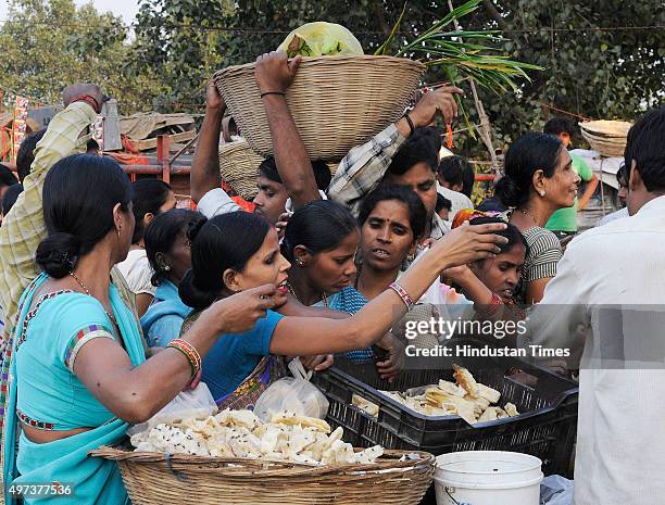 People buying puja ingredients for the upcoming Chhath Puja at Geeta Colony, on November 16, 2015 in New Delhi, India. The Goddess who is worshipped...