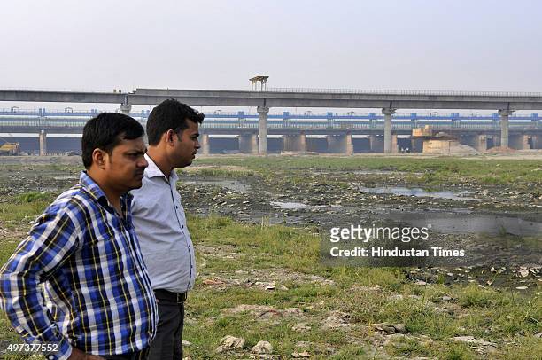 Chhath devotees inspecting the bank of river Yamuna to start the preparations for the Chhath Puja on November 16, 2015 in Noida, India. They are very...