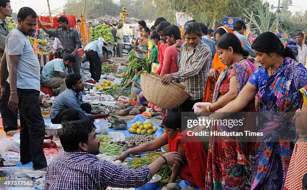 People buying puja ingredients for the upcoming Chhath Puja at Geeta Colony, on November 16, 2015 in New Delhi, India. The Goddess who is worshipped...