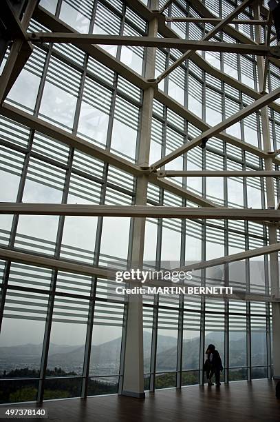 People visit the lookout of the Costanera Center tower in Santiago on November 16, 2015. The Costanera Cernter has the highest lookout in South...