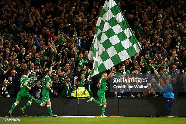 Jon Walters of the Republic of Ireland celebrates after scoring the opening goal from the penalty spot during the UEFA EURO 2016 Qualifier play off,...