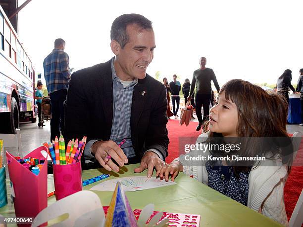 Mayor of Los Angeles Eric Garcetti and daughter Maya attend Express Yourself 2015 to benefit P.S. ARTS, providing arts education to 25,000 public...