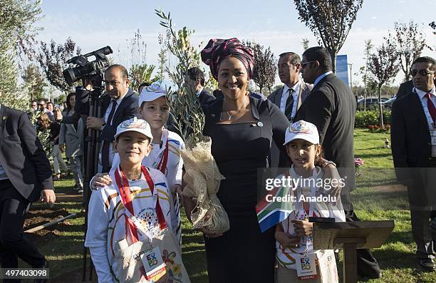 Singapore's Prime Minister Lee Hsien Loong's wife Ho Ching, Secretary-General of the Organization for Economic Co-operation and Development Jose...