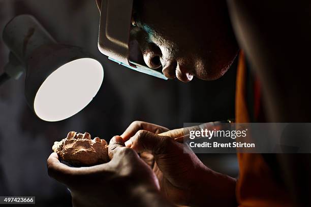 Trained Dasenetch pastoralist men clean fossils at the Ileret Turkana Basin Institute in Lake Turkana in North Kenya, 20 May 2010. The Lake Turkana...