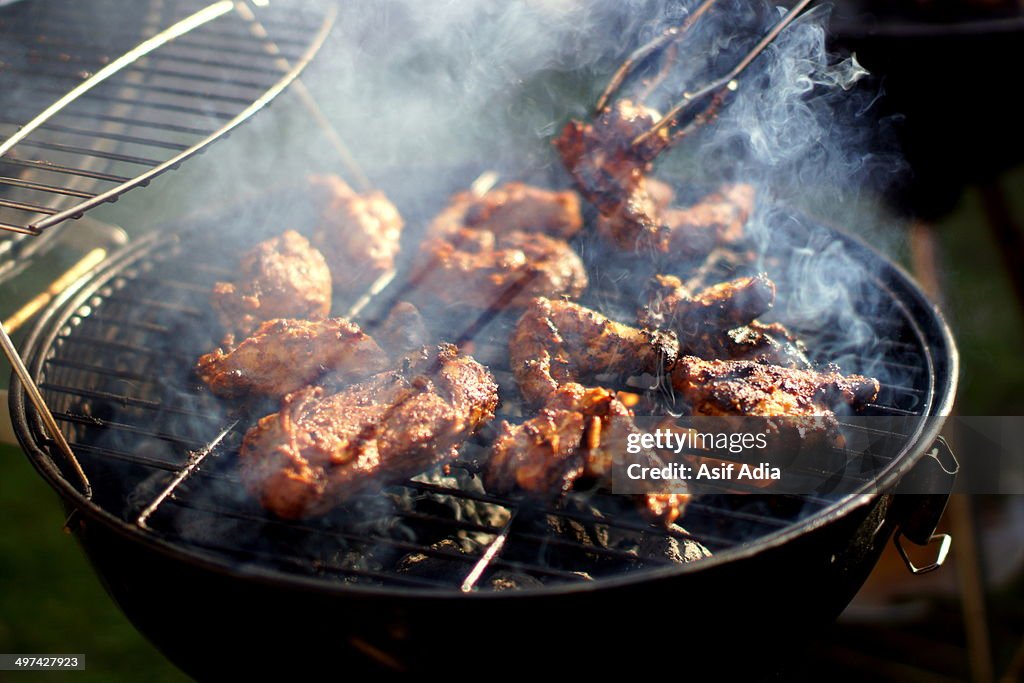 Smokey barbecue chicken on a smokey