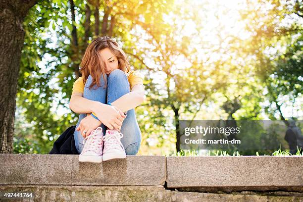 depressed teenage girl - depressed teenager stock pictures, royalty-free photos & images