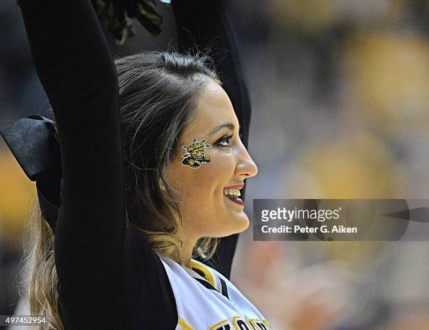 Wichita State Shockers cheerleader performs during a game against the Charleston Southern Buccaneers on November 13, 2015 at Charles Koch Arena in...