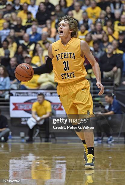 Guard Ron Baker of the Wichita State Shockers brings the ball up the field against the Charleston Southern Buccaneers during the first half on...