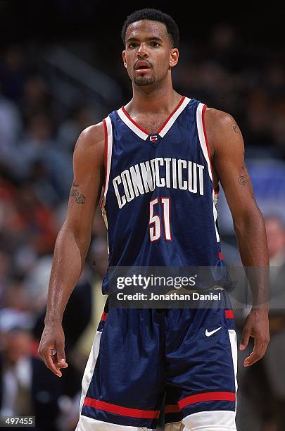 Edmund Saunders of the Connecticut Huskies looks on the court during the game against the Arizona Wildcats at the United Center in Chicago, Illinois....