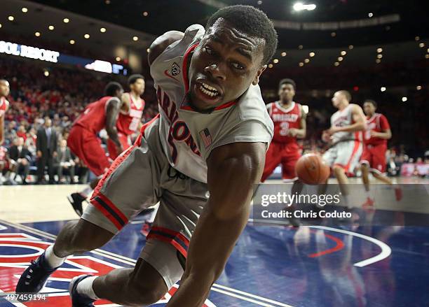 Kadeem Allen of the Arizona Wildcats stumbles after a first half layup during the college basketball game against the Bradley Braves at McKale Center...