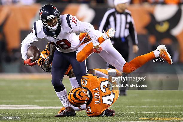 Dre Kirkpatrick of the Cincinnati Bengals and George Iloka of the Cincinnati Bengals combine to tackle Cecil Shorts III of the Houston Texans during...