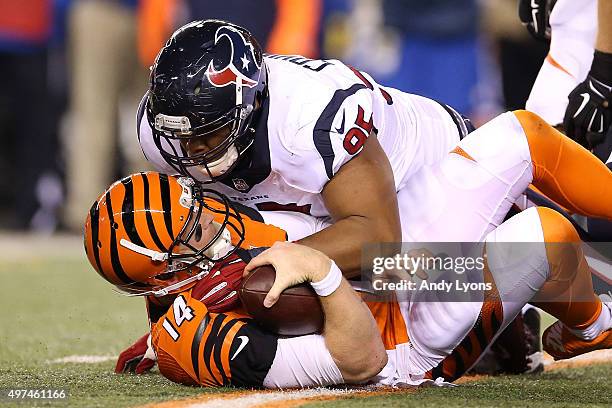 Christian Covington of the Houston Texans sacks Andy Dalton of the Cincinnati Bengals during the third quarter at Paul Brown Stadium on November 16,...