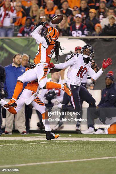 Adam Jones of the Cincinnati Bengals breaks up a pass intended for DeAndre Hopkins of the Houston Texans during the fourth quarter at Paul Brown...