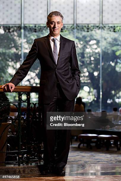 Frank Appel, chief executive officer of Deutsche Post AG, stands for a photograph following a Bloomberg Televison at the Asia-Pacific Economic...
