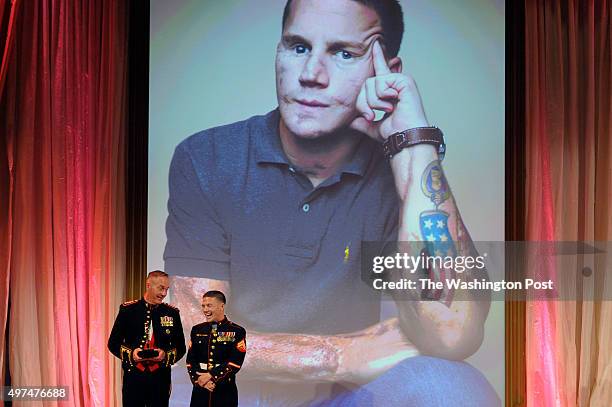 General Joseph Dunford presents the the first American Portrait Prize to Corporal Kyle Carpenter at the National Portrait Gallery November 15, 2015...