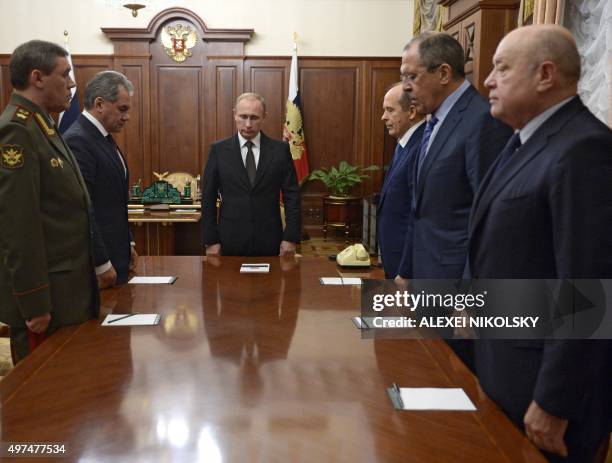 Russian President Vladimir Putin , Defence Minister Sergei Shoigu , Russian Army chief of staff Valery Gerasimov , head of the Federal Security...