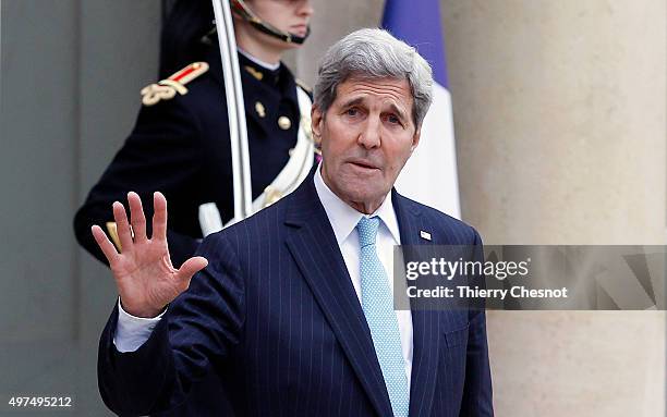 Secretary of State John Kerry leaves after a meeting with French President Francois Hollande at the Elysee Presidential Palace on November 17, 2015...