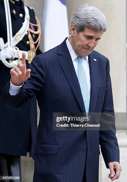 Secretary of State John Kerry leaves after a meeting with French President Francois Hollande at the Elysee Presidential Palace on November 17, 2015...